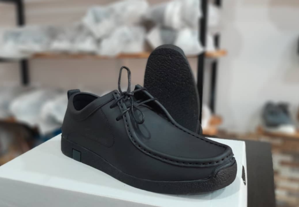 Sleek Black Leather Sneakers